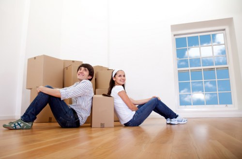 Moving team handling stairs in a Crystal Palace flat