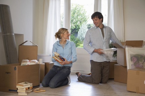 Moving crew handling items in a Crystal Palace flat or house