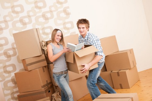 Professional removal team handling furniture in South London